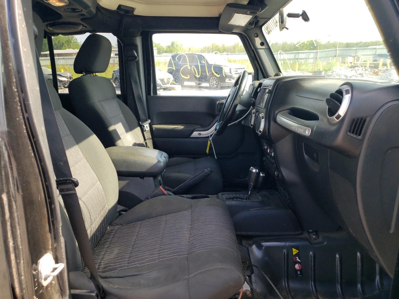 Photo 5 from auction – 2011 JEEP WRANGLER U with VIN 1J4BA5H18BL572672