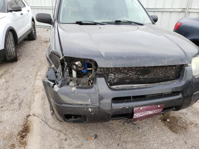 Photo 9 from auction – 2004 FORD ESCAPE LIM with VIN 1FMCU04134KA53737
