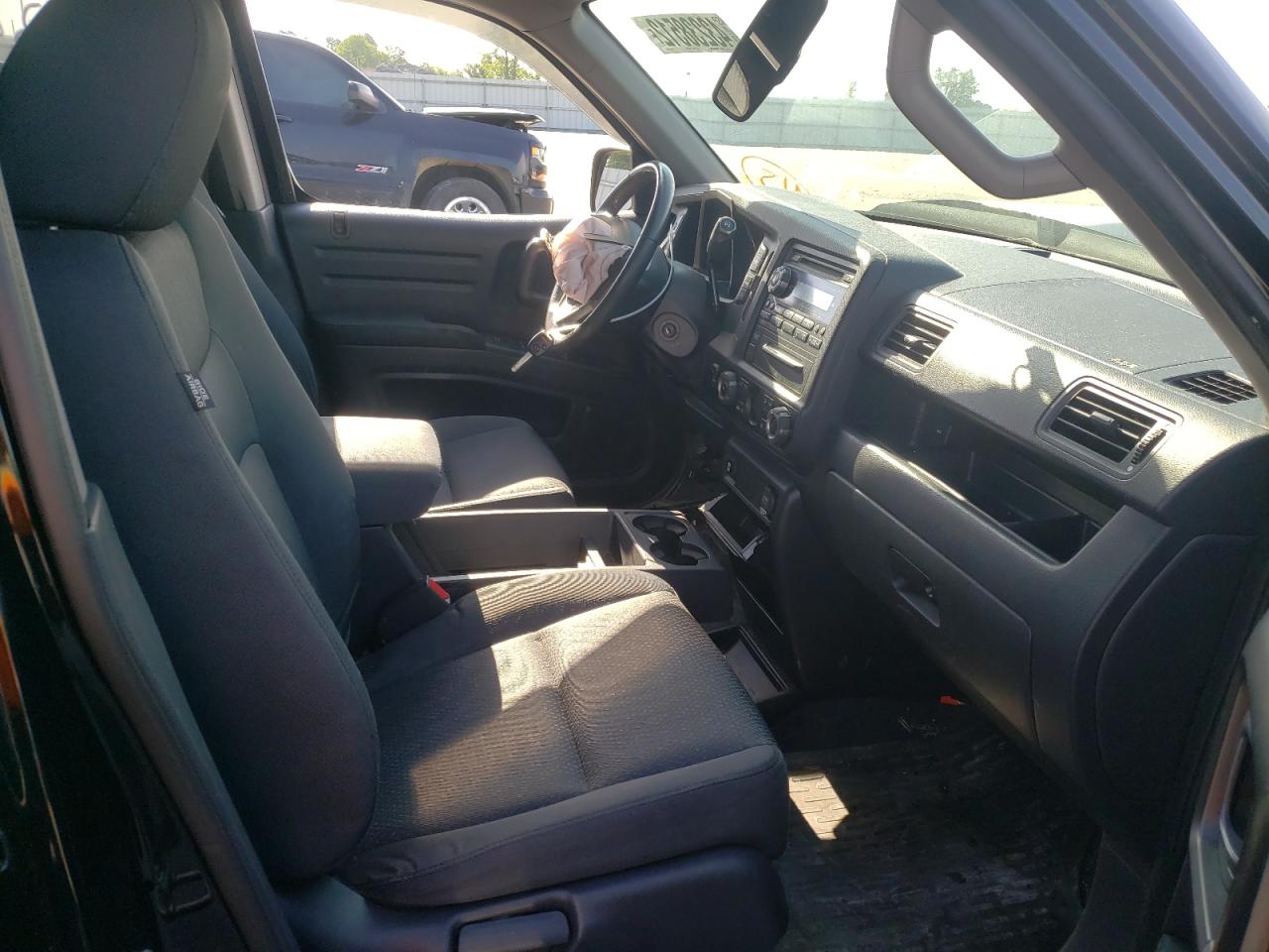 Photo 5 from auction – 2014 HONDA RIDGELINE with VIN 5FPYK1F74EB001384