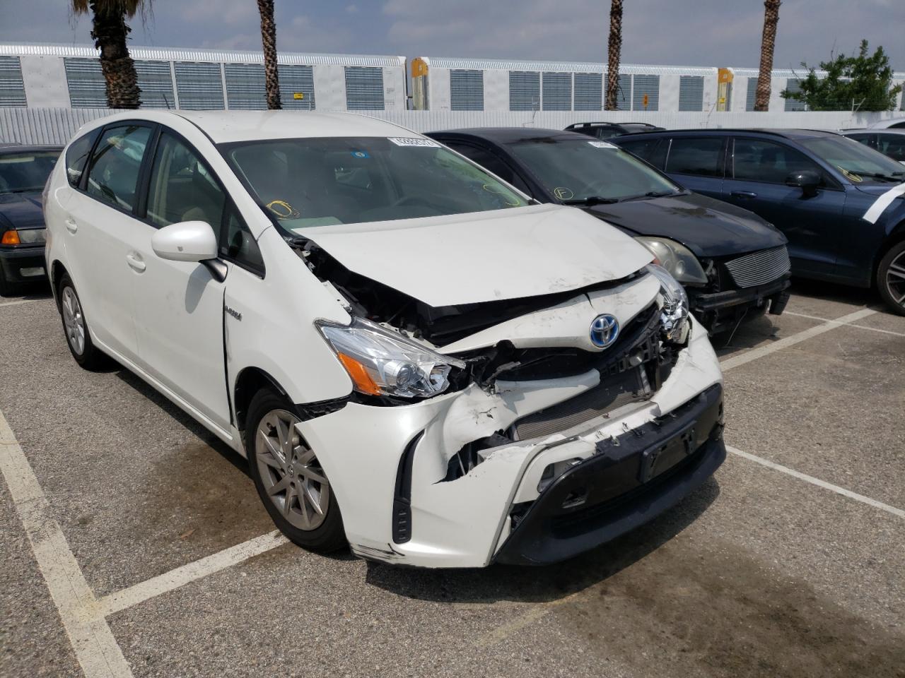 TOYOTA PRIUS V 2015 with VIN JTDZN3EU5FJ023248 - Photo from auction