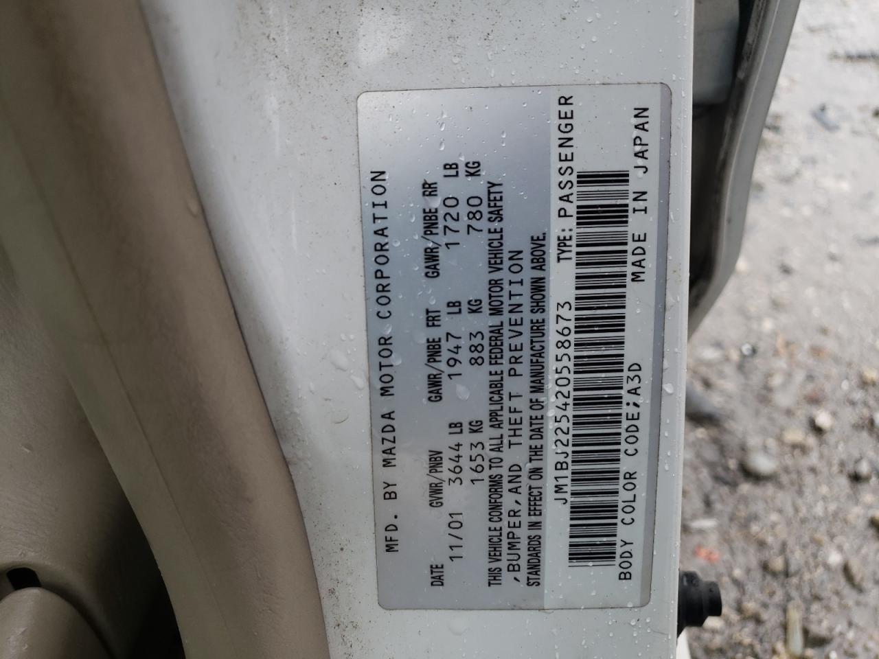 Photo 10 from auction – 2002 MAZDA PROTEGE DX with VIN JM1BJ225420558673