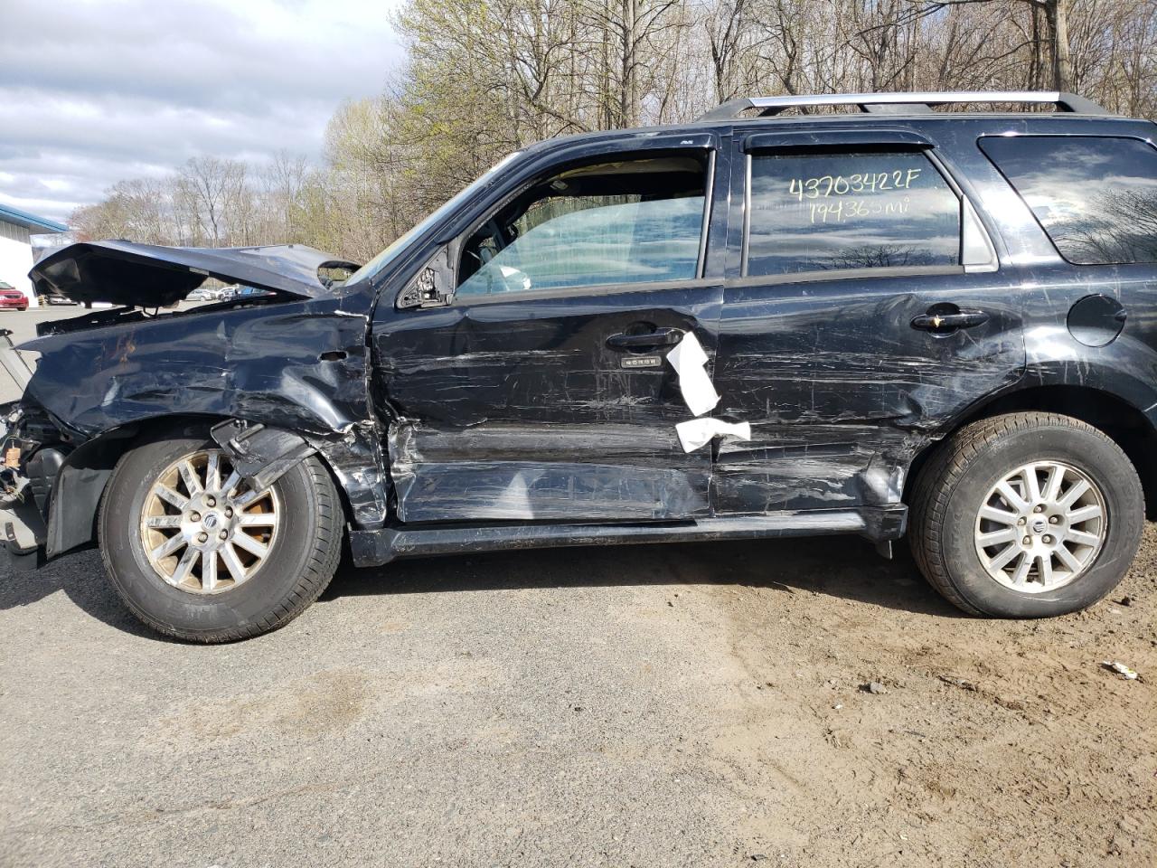 Photo 9 from auction – 2009 MERCURY MARINER PR with VIN 4M2CU87779KJ14429
