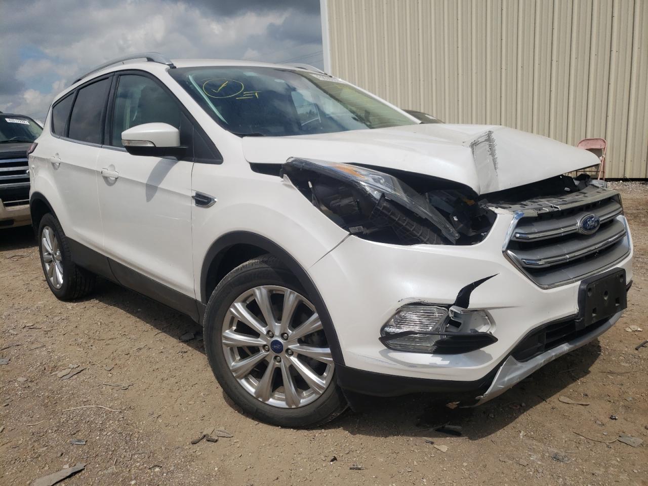 FORD ESCAPE TIT 2017 with VIN 1FMCU0JD3HUA60888 - Photo from auction