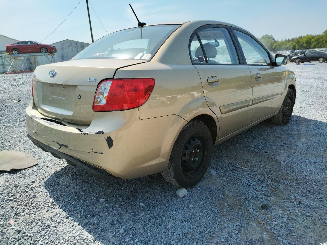 Photo 4 from auction – 2011 KIA RIO BASE with VIN KNADH4A36B6912042