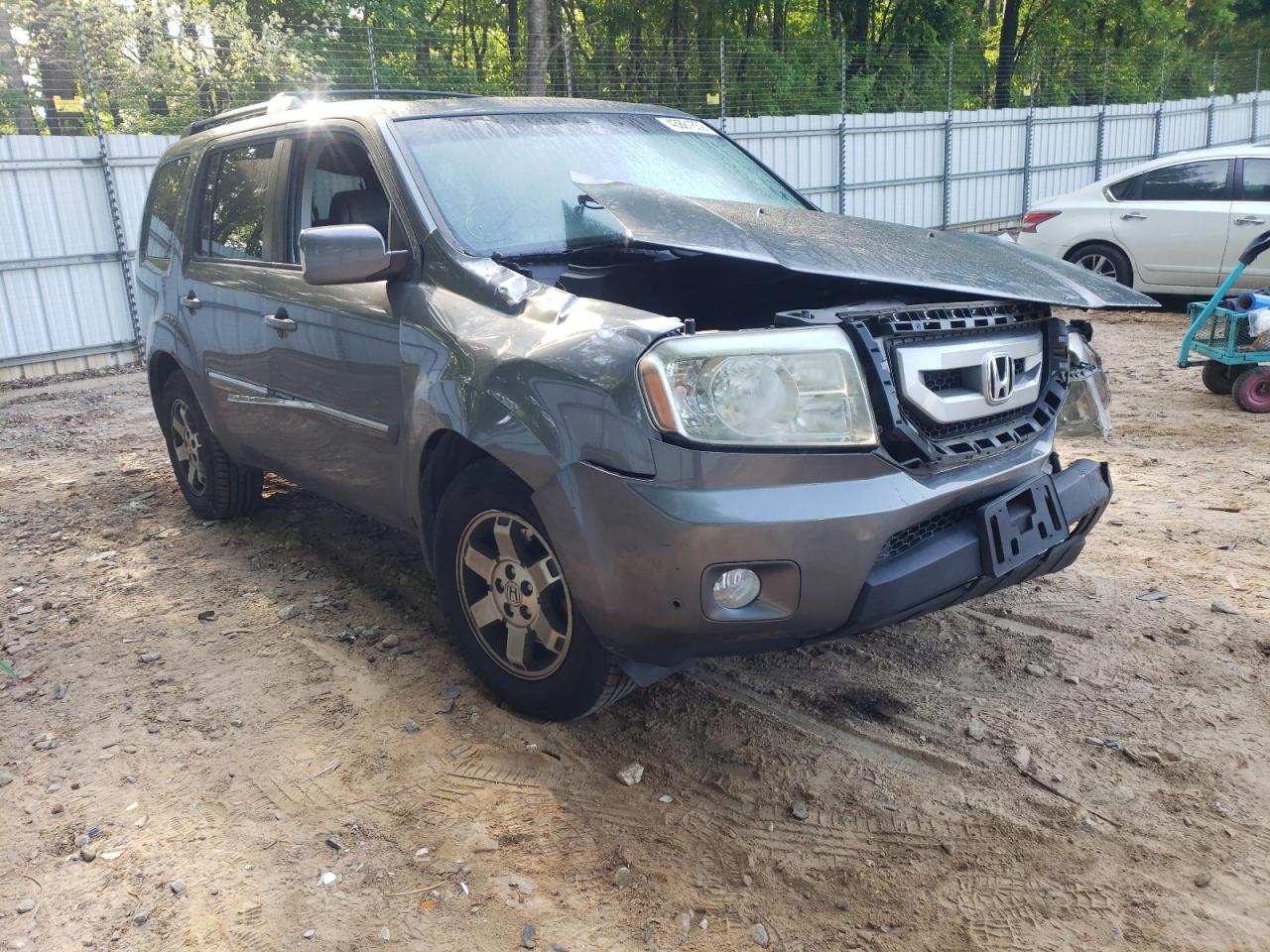 HONDA PILOT TOUR 2011 с VIN 5FNYF3H95BB046076 - Фото с аукциона