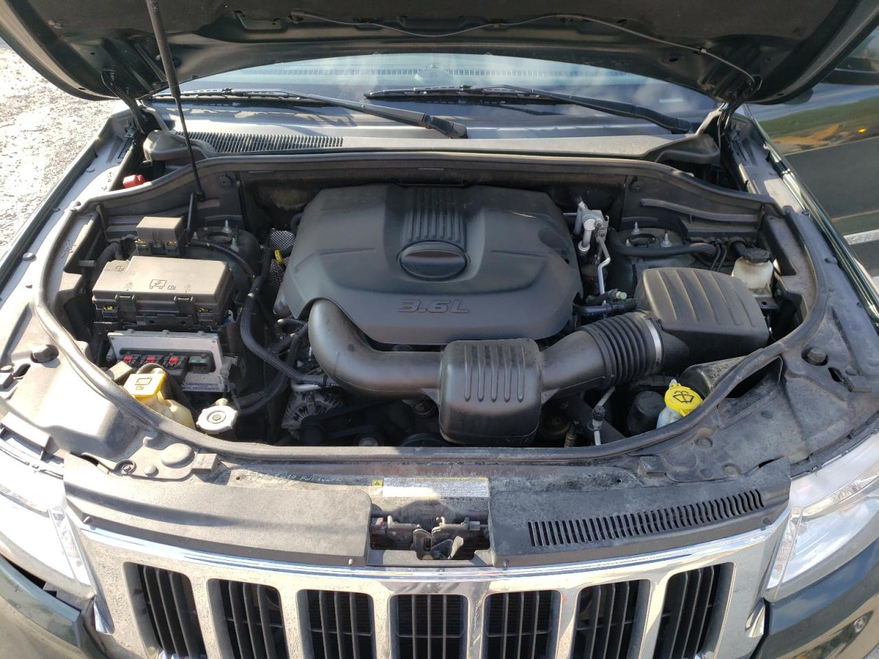 Photo 7 from auction – 2011 JEEP GRAND CHER with VIN 1J4RR4GG7BC570242