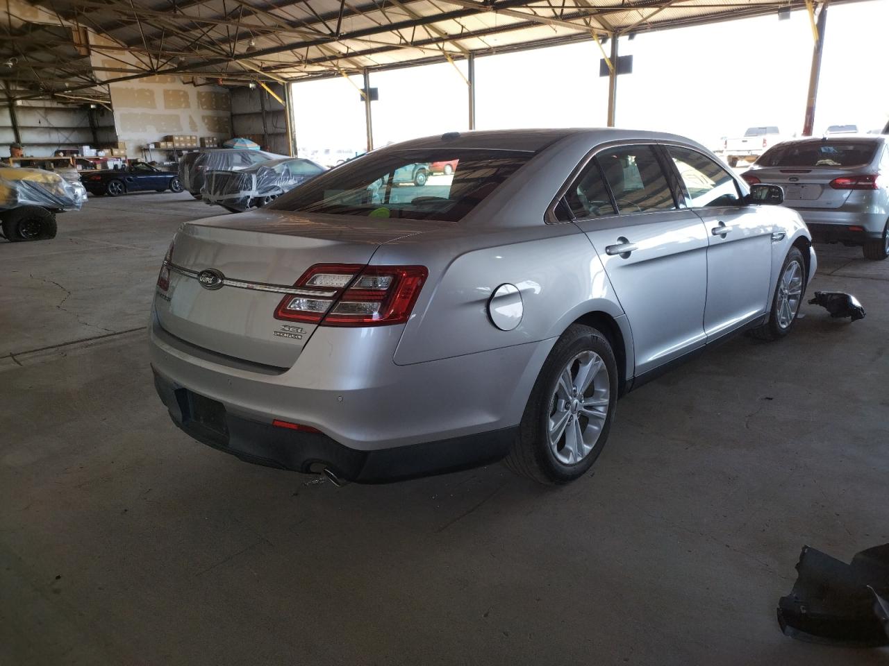 Photo 4 from auction – 2013 FORD TAURUS SEL with VIN 1FAHP2E84DG211701