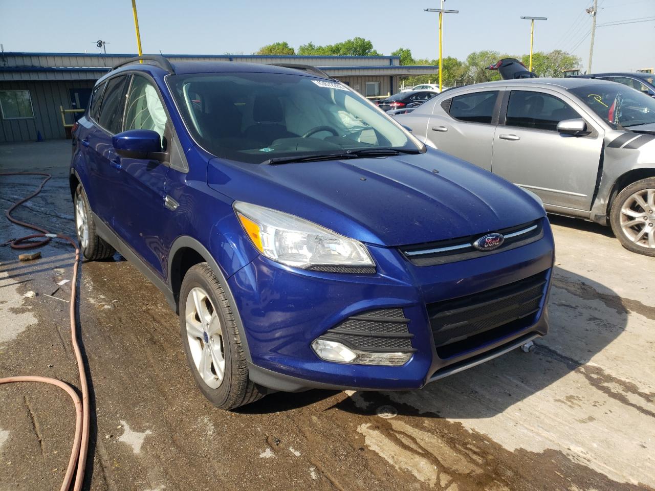 Photo 1 from auction – 2014 FORD ESCAPE SE with VIN 1FMCU0GX1EUE33231