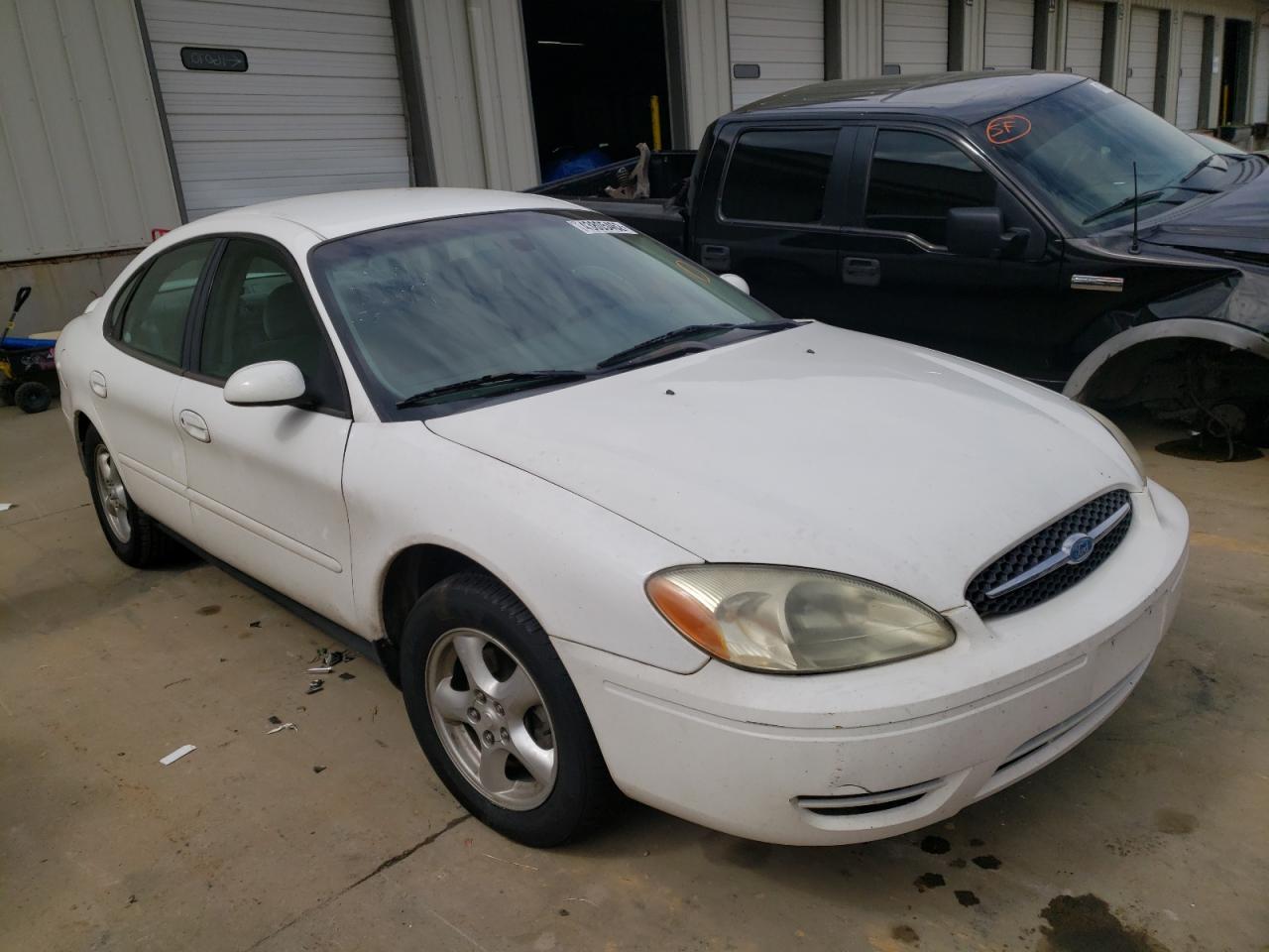 FORD TAURUS SE 2003 with VIN 1FAFP53U03A150860 - Photo from auction