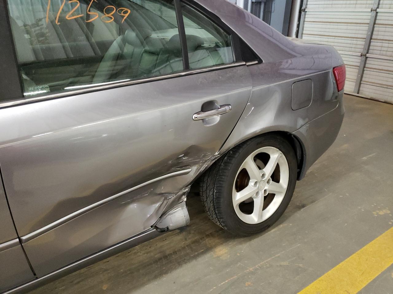 Photo 9 from auction – 2006 HYUNDAI UK with VIN 5NPEU46F66H059708