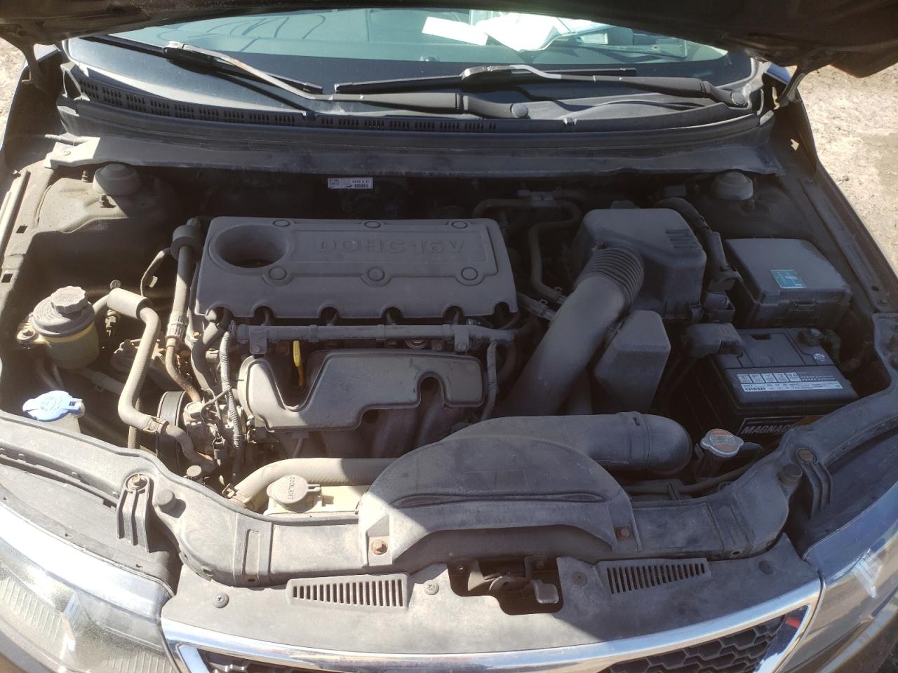 Photo 7 from auction – 2011 KIA FORTE LX with VIN KNAFT4A25B5415049