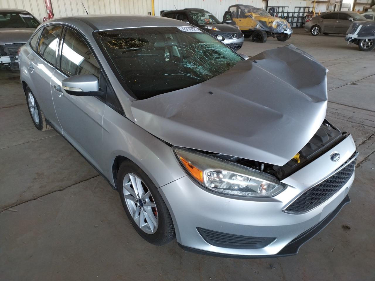 FORD FOCUS SE 2017 with VIN 1FADP3F22HL254557 - Photo from auction