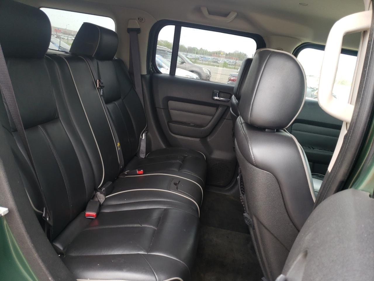 Photo 6 from auction – 2006 HUMMER H3 with VIN 5GTDN136368119740