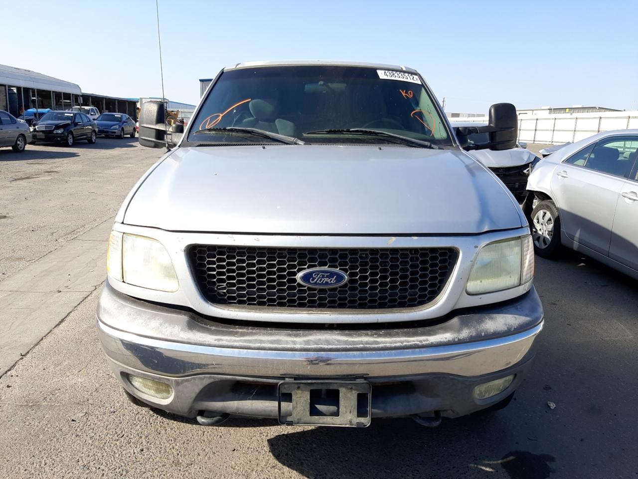Photo 9 from auction – 2003 FORD F150 with VIN 1FTRX18LX3NB43360