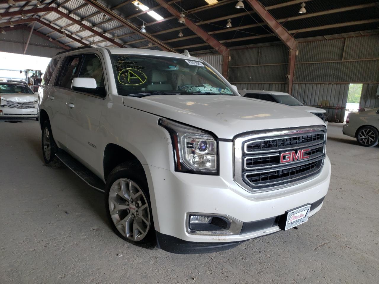GMC YUKON SLT 2017 with VIN 1GKS1BKC5HR298260 - Photo from auction