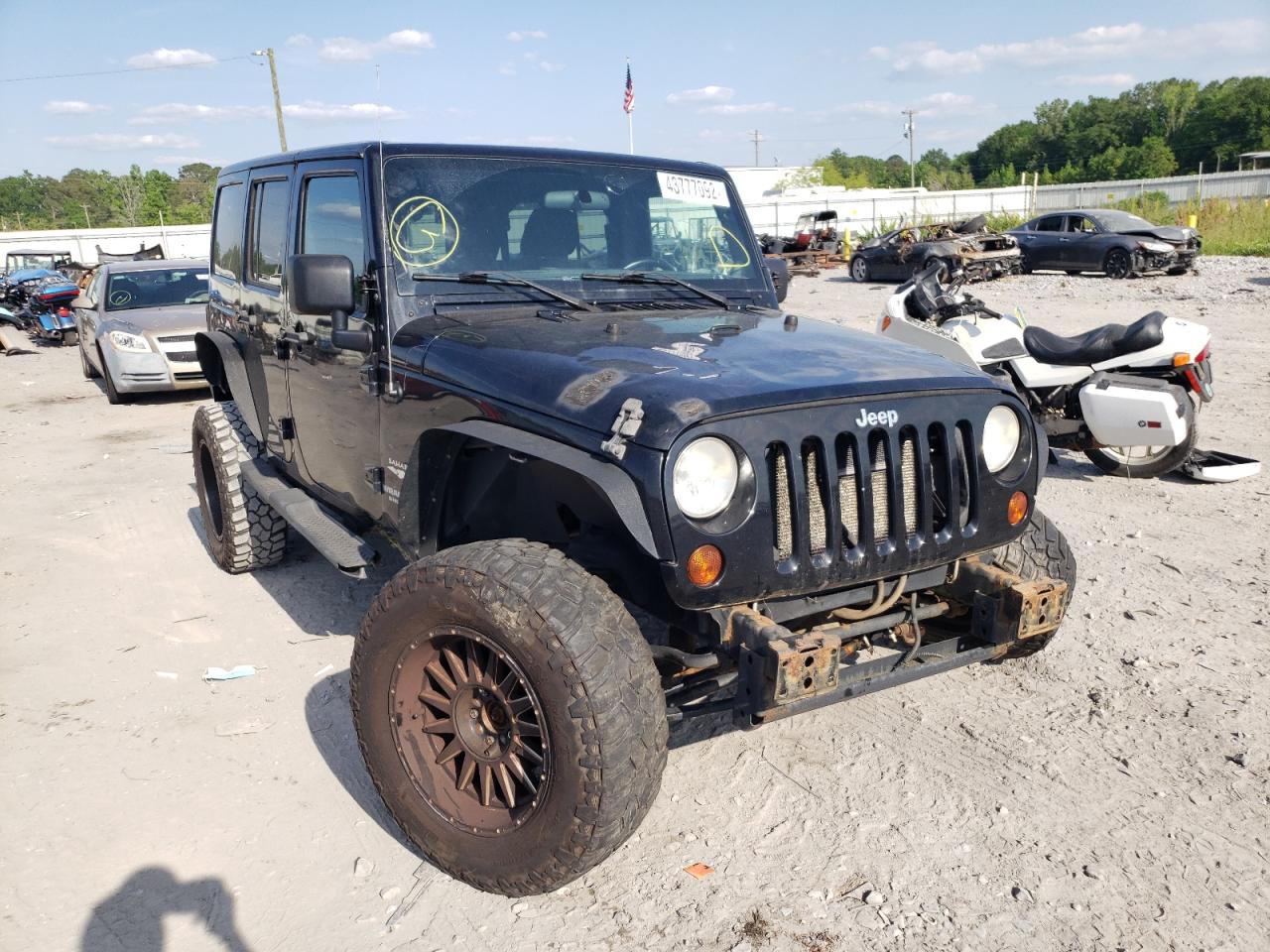 JEEP WRANGLER U 2011 z numerem VIN 1J4BA5H18BL572672 - Zdjęcie z aukcji