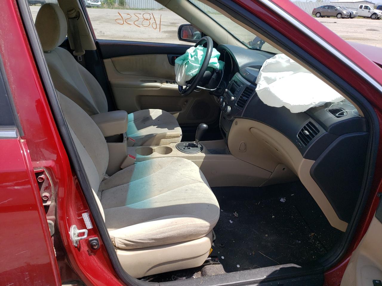 Photo 5 from auction – 2009 KIA OPTIMA LX with VIN KNAGE228X95325928