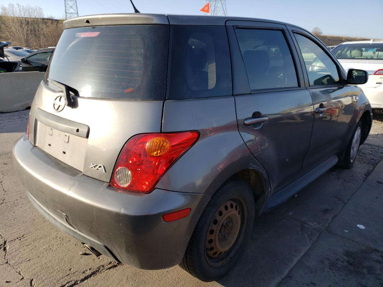Photo 4 from auction – 2005 TOYOTA SCION XA with VIN JTKKT624650085137