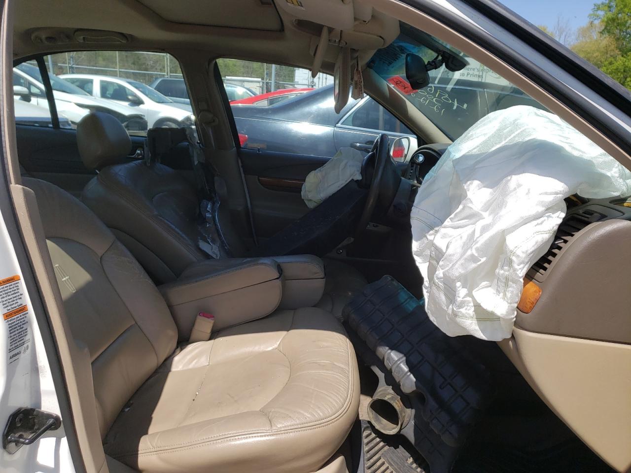 Photo 5 from auction – 2002 LINCOLN CONTINENTA with VIN 1LNHM97V72Y655558