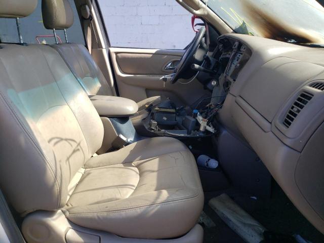 Photo 9 from auction – 2002 MAZDA TRIBUTE LX with VIN 4F2YU08102KM03911
