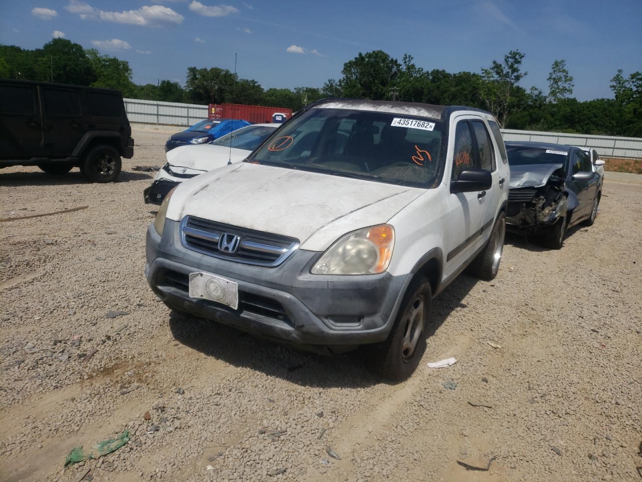 Photo 2 from auction – 2002 HONDA CR-V LX with VIN JHLRD68472C011510