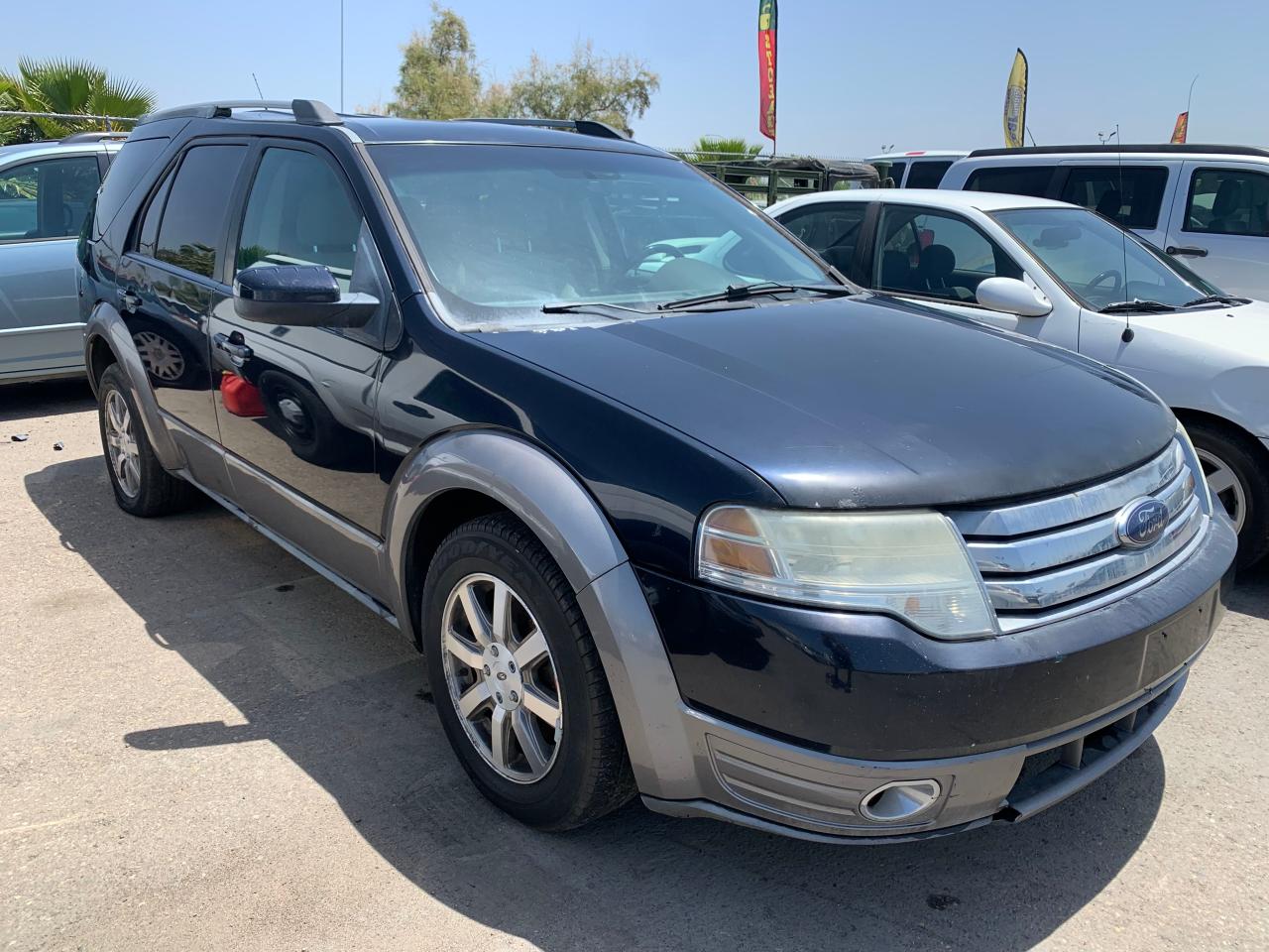 FORD TAURUS X S 2008 with VIN 1FMDK02W08GA09907 - Photo from auction