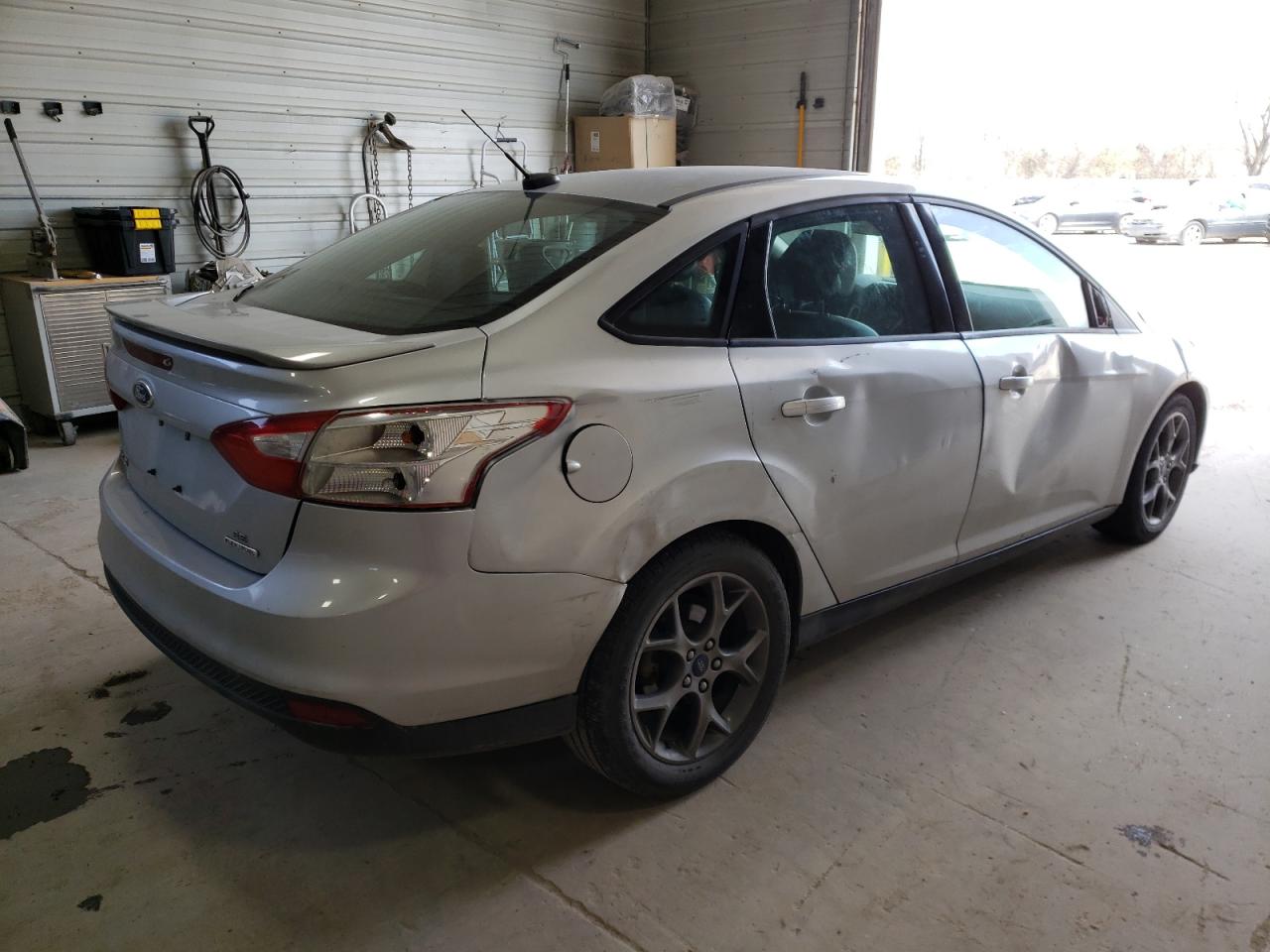 Photo 4 from auction – 2013 FORD FOCUS SE with VIN 1FADP3F23DL302240