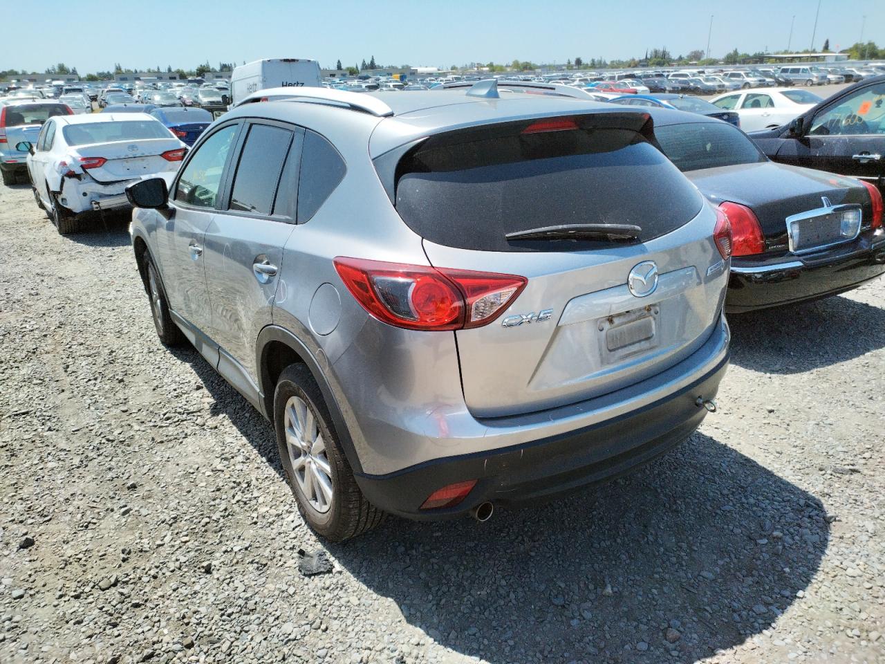 Photo 3 from auction – 2014 MAZDA CX-5 TOURI with VIN JM3KE2CY2E0306929