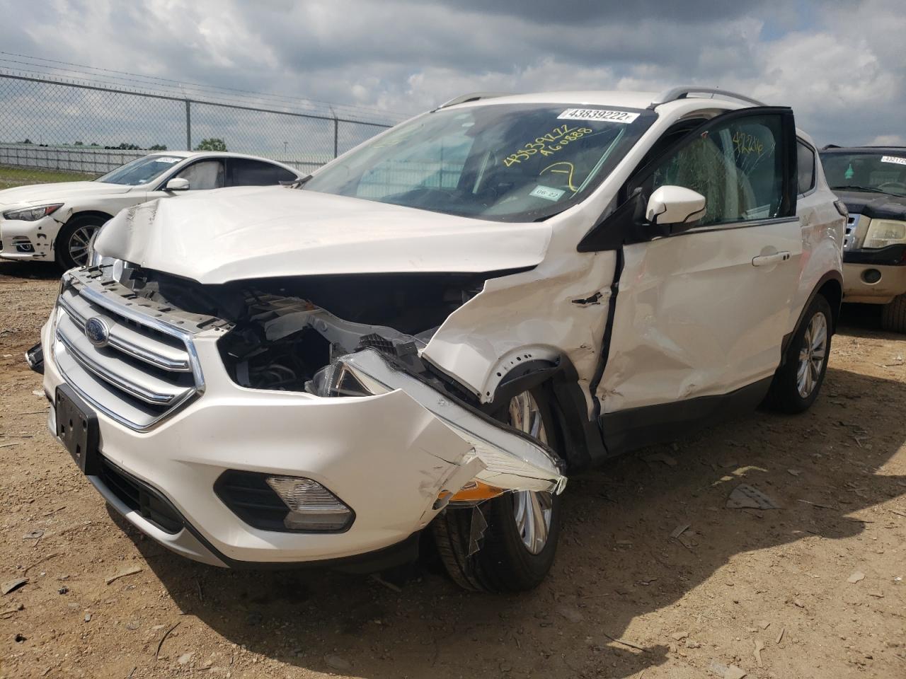 Photo 2 from auction – 2017 FORD ESCAPE TIT with VIN 1FMCU0JD3HUA60888