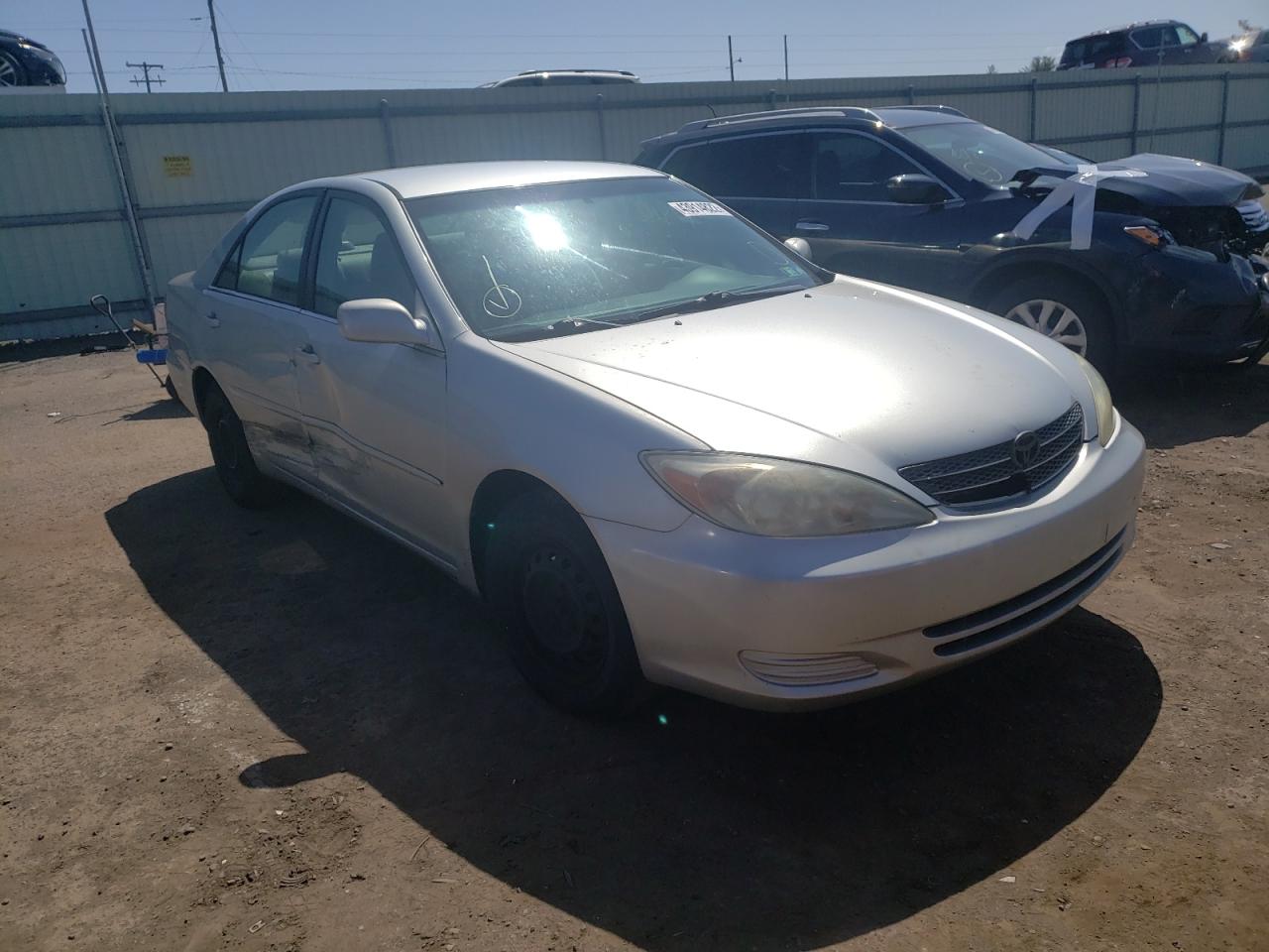 TOYOTA CAMRY LE 2004 with VIN 4T1BE32K04U299333 - Photo from auction