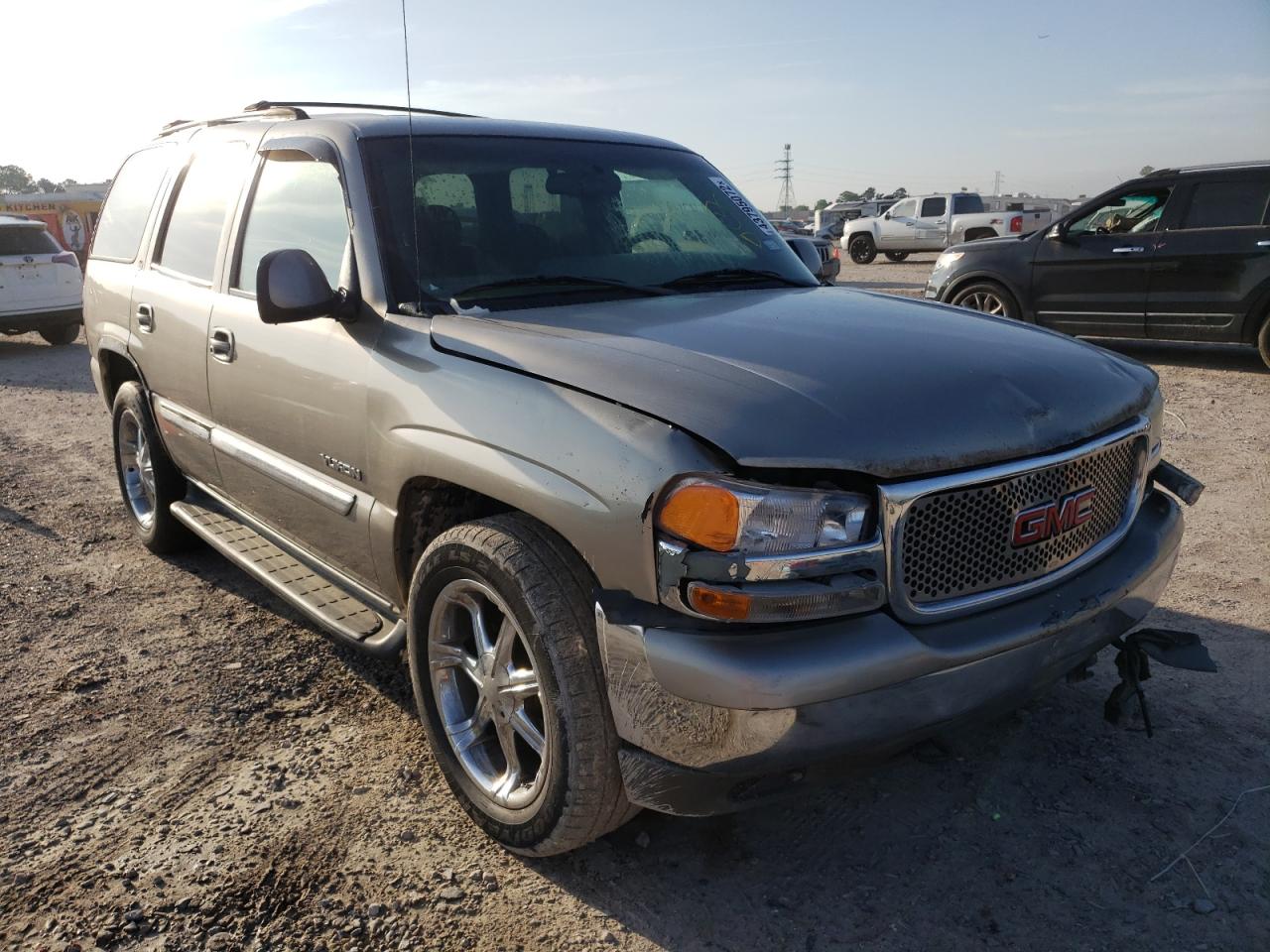 GMC YUKON 2002 with VIN 1GKEC13Z02R246210 - Photo from auction