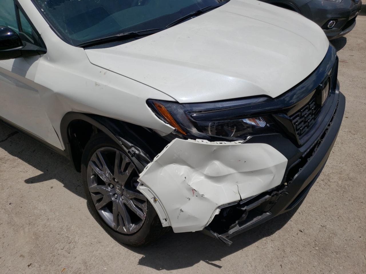 Photo 9 from auction – 2019 HONDA PASSPORT E with VIN 5FNYF7H5XKB001204