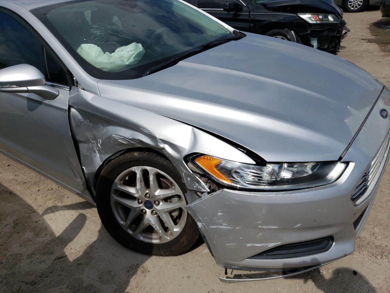 Photo 9 from auction – 2016 FORD FUSION SE with VIN 3FA6P0H76GR200128
