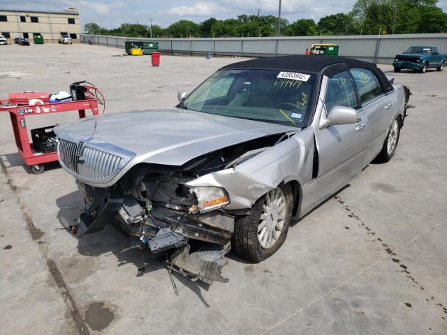 Photo 2 from auction – 2003 LINCOLN TOWN CAR E with VIN 1LNHM81W13Y649414