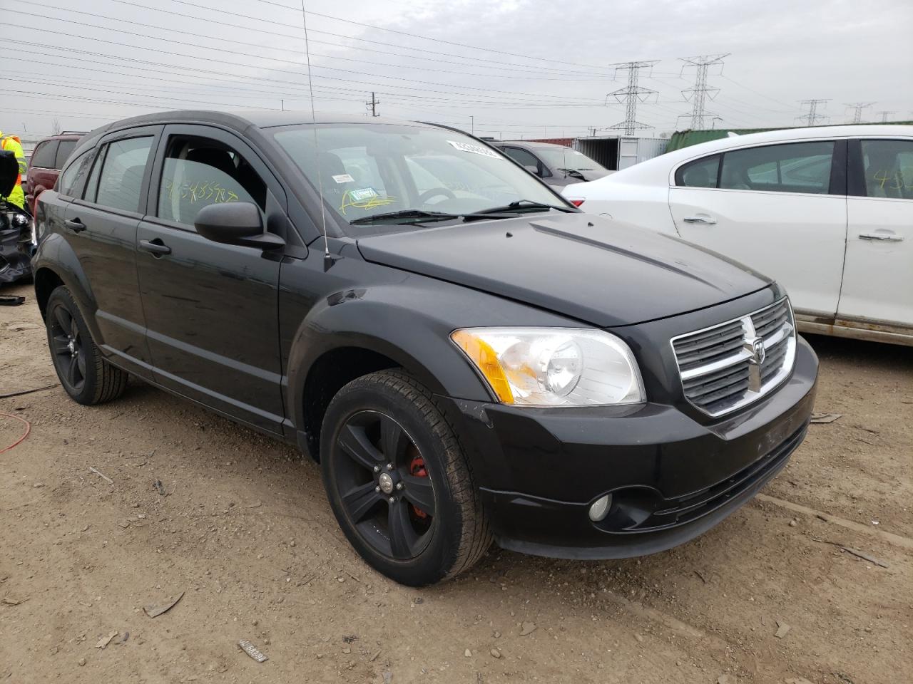DODGE CALIBER MA 2011 with VIN 1B3CB3HA8BD120129 - Photo from auction