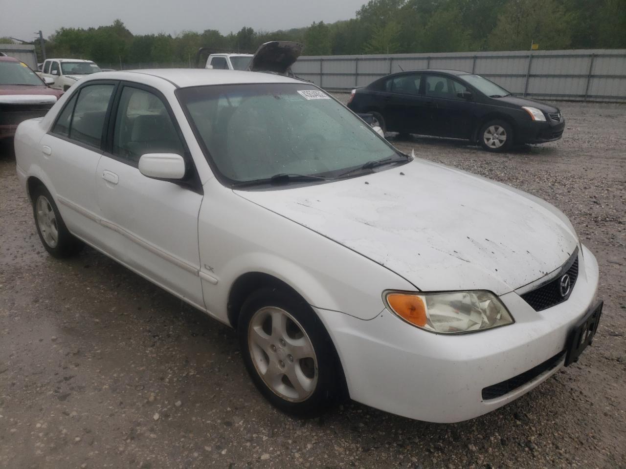 MAZDA PROTEGE DX 2002 with VIN JM1BJ225420558673 - Photo from auction