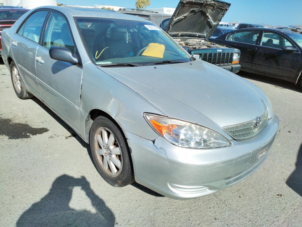 TOYOTA CAMRY LE 2002 with VIN 4T1BF30K32U500591 - Photo from auction