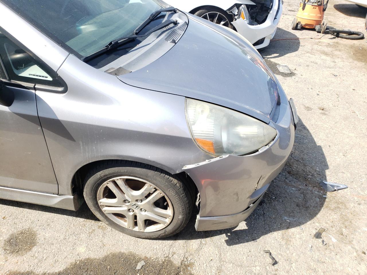 Photo 9 from auction – 2007 HONDA FIT S with VIN JHMGD38657S020450