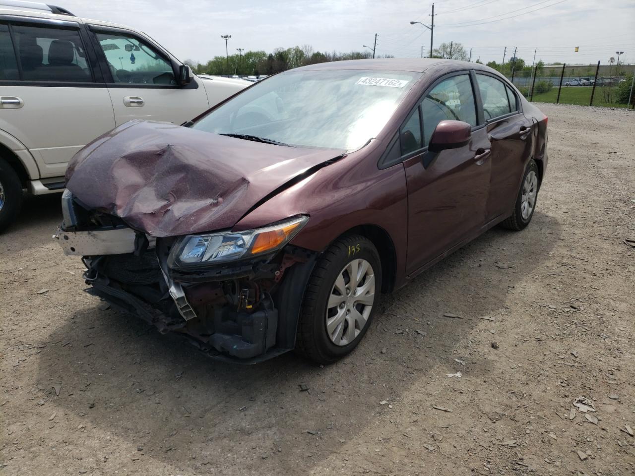 Photo 2 from auction – 2012 HONDA CIVIC LX with VIN 19XFB2F58CE074510