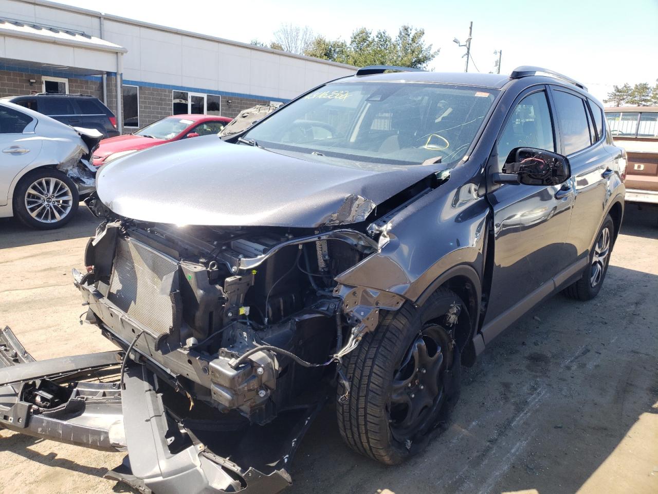 Photo 2 from auction – 2017 TOYOTA RAV4 LE with VIN JTMBFREV3HJ105041