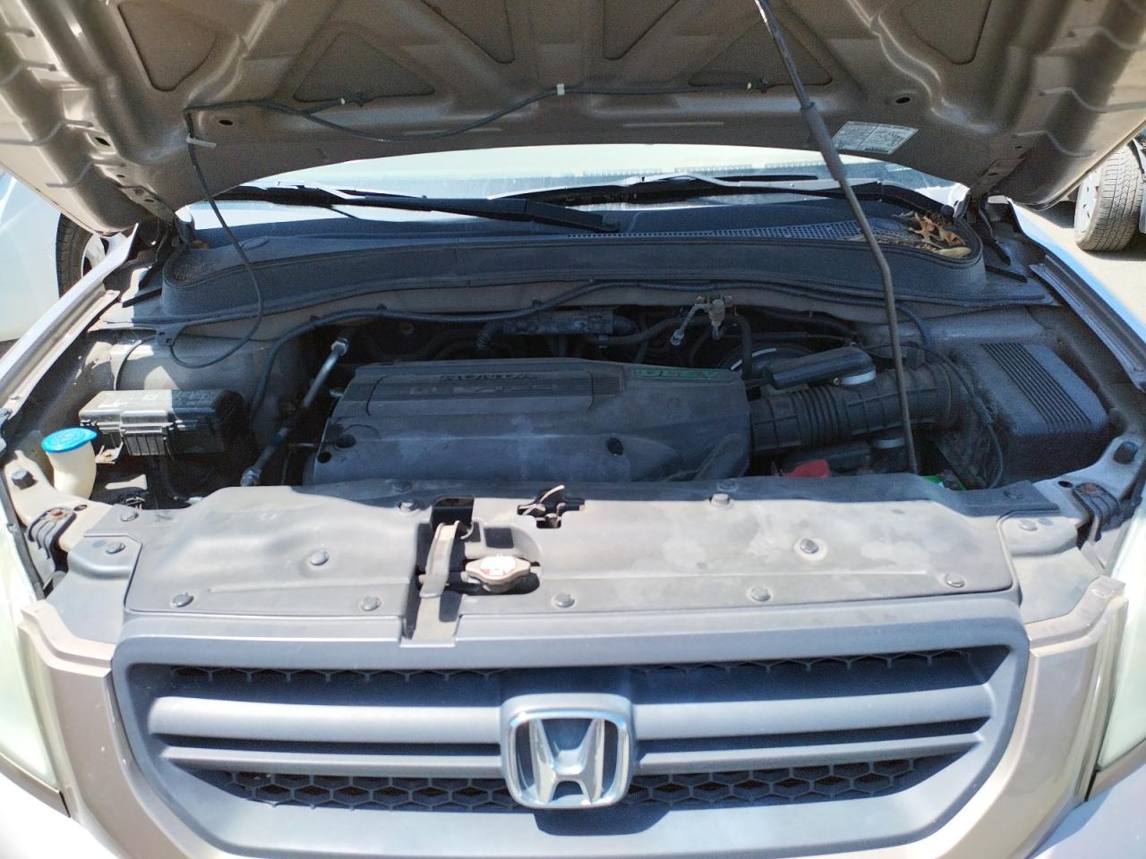 Фото 7 с аукциона – 2004 HONDA PILOT с VIN 2HKYF18594H554072