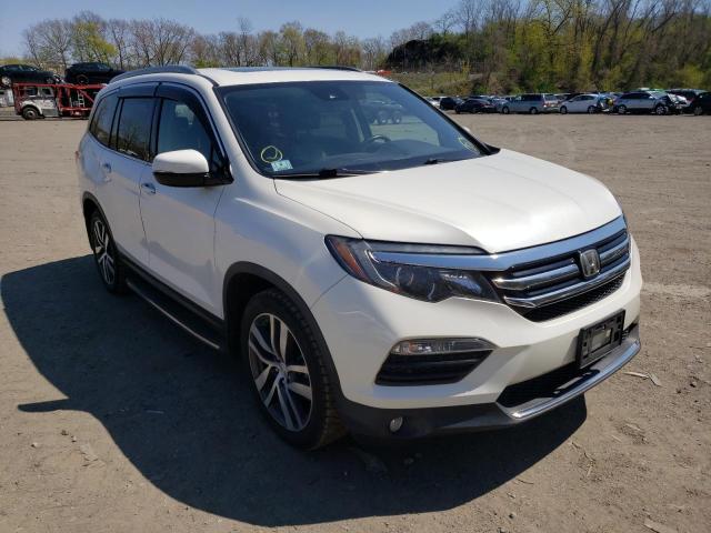 Photo 4 from auction – 2017 HONDA PILOT ELIT with VIN 5FNYF6H06HB036748