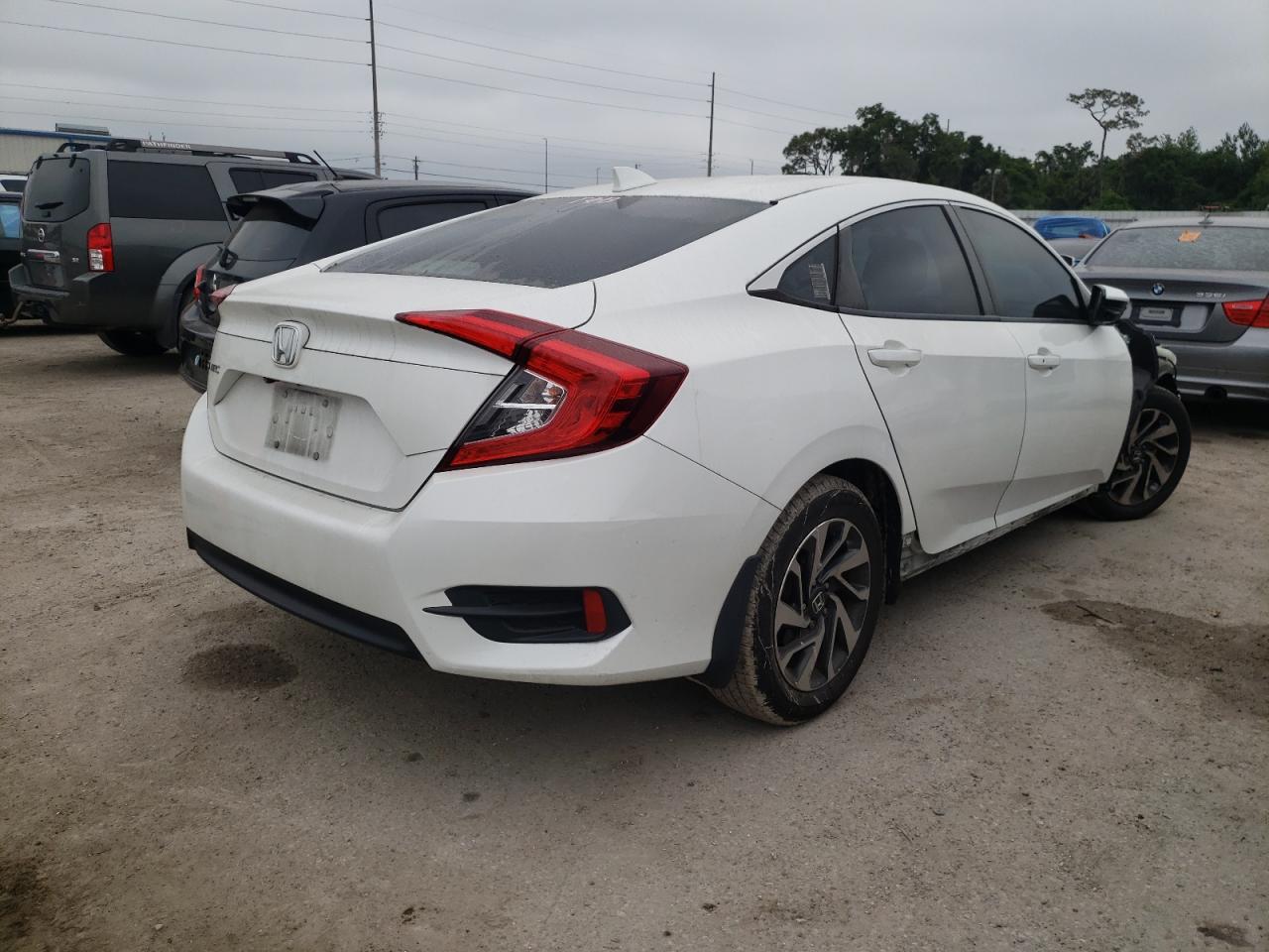 Photo 4 from auction – 2017 HONDA CIVIC EX with VIN 19XFC2F71HE069686