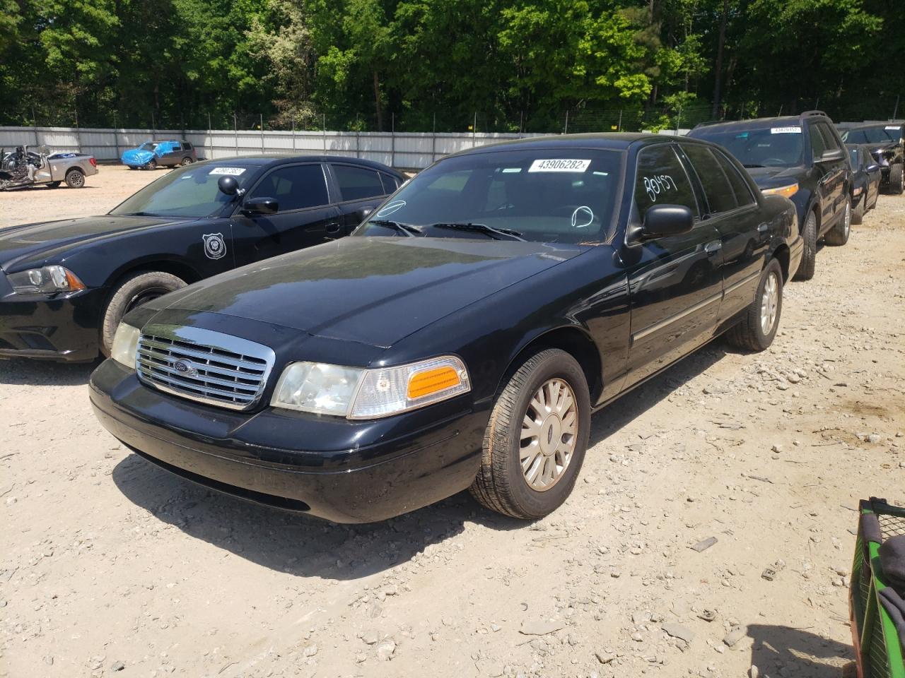 Photo 2 from auction – 2011 FORD CROWN VICT with VIN 2FABP7BV0BX118808