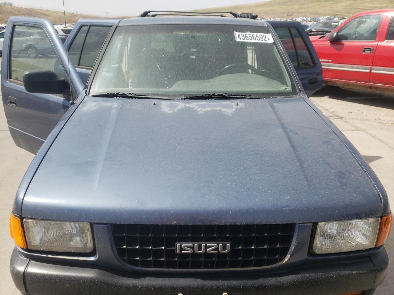 Photo 7 from auction – 1997 ISUZU RODEO S with VIN 4S2CM58VXV4304441