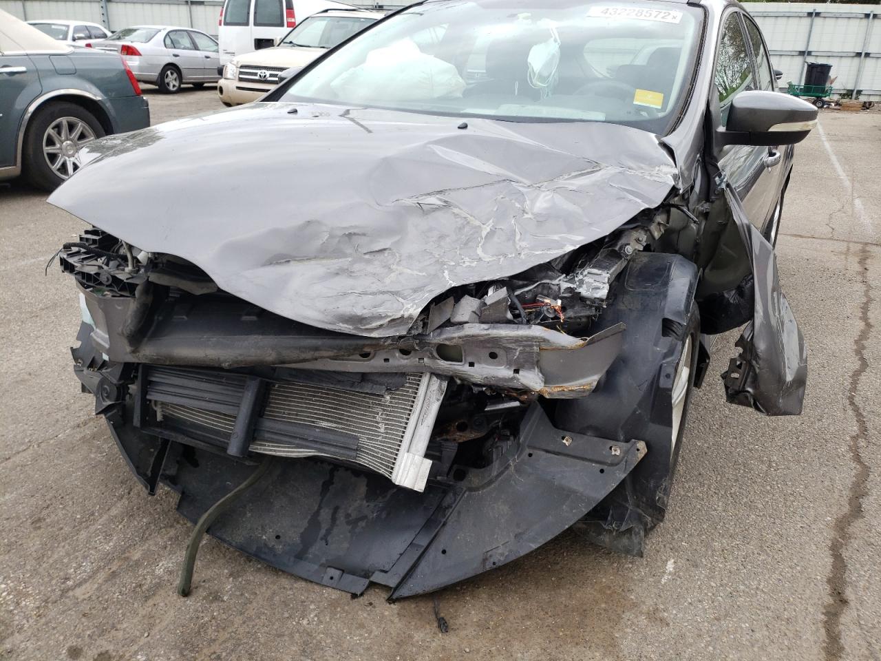Foto 9 de la subasta – 2013 FORD FOCUS SE con VIN 1FADP3K26DL200128