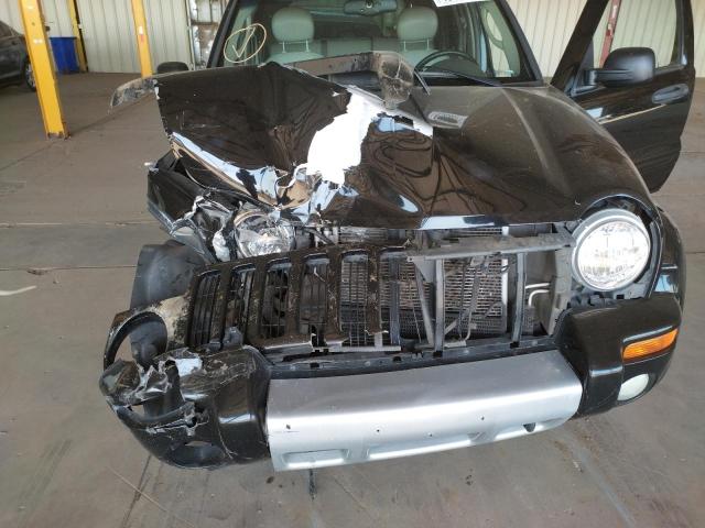 Photo 7 from auction – 2003 JEEP LIBERTY RE with VIN 1J4GL38K93W713052