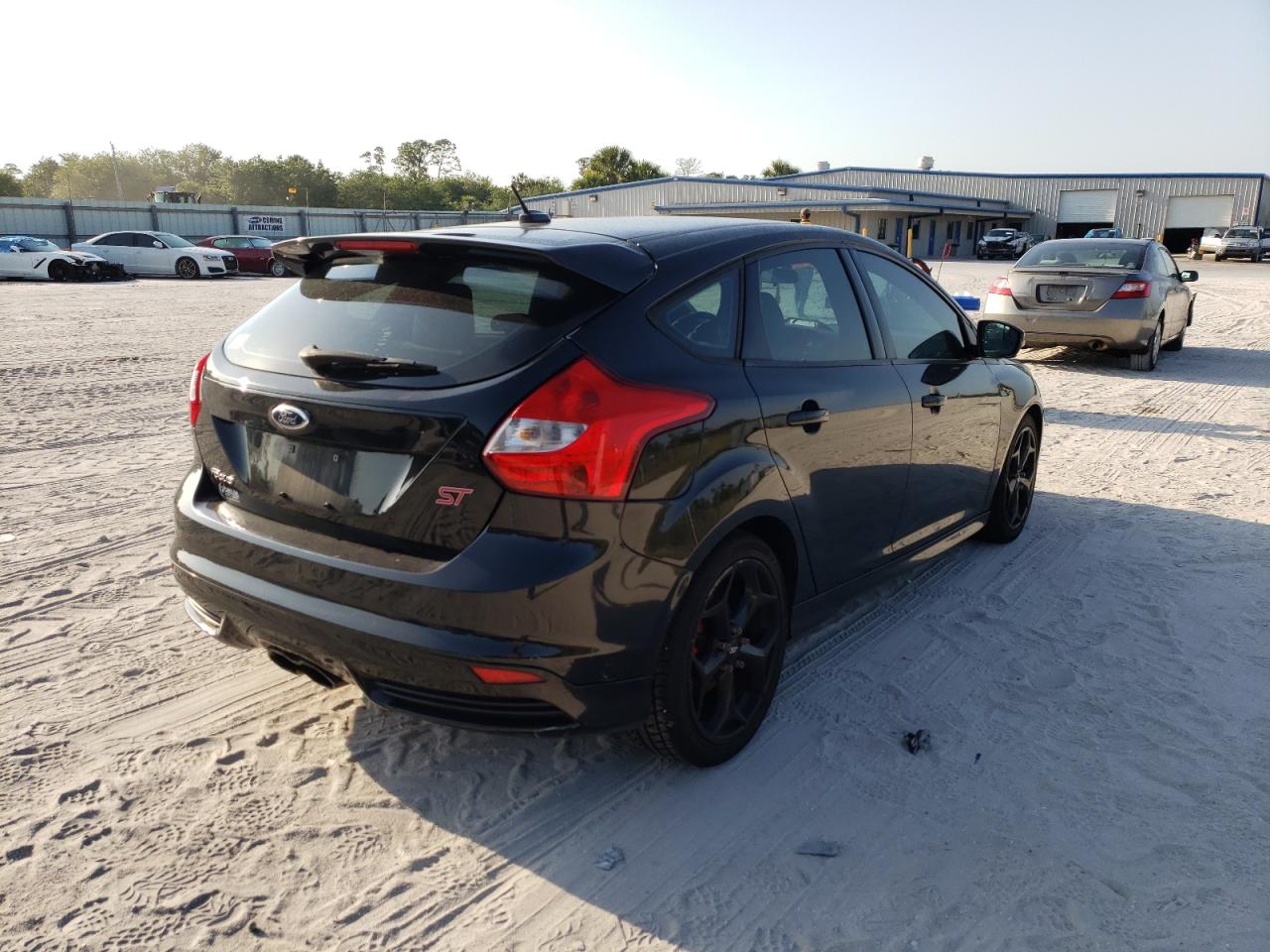 Photo 4 from auction – 2014 FORD FOCUS ST with VIN 1FADP3L96EL215533
