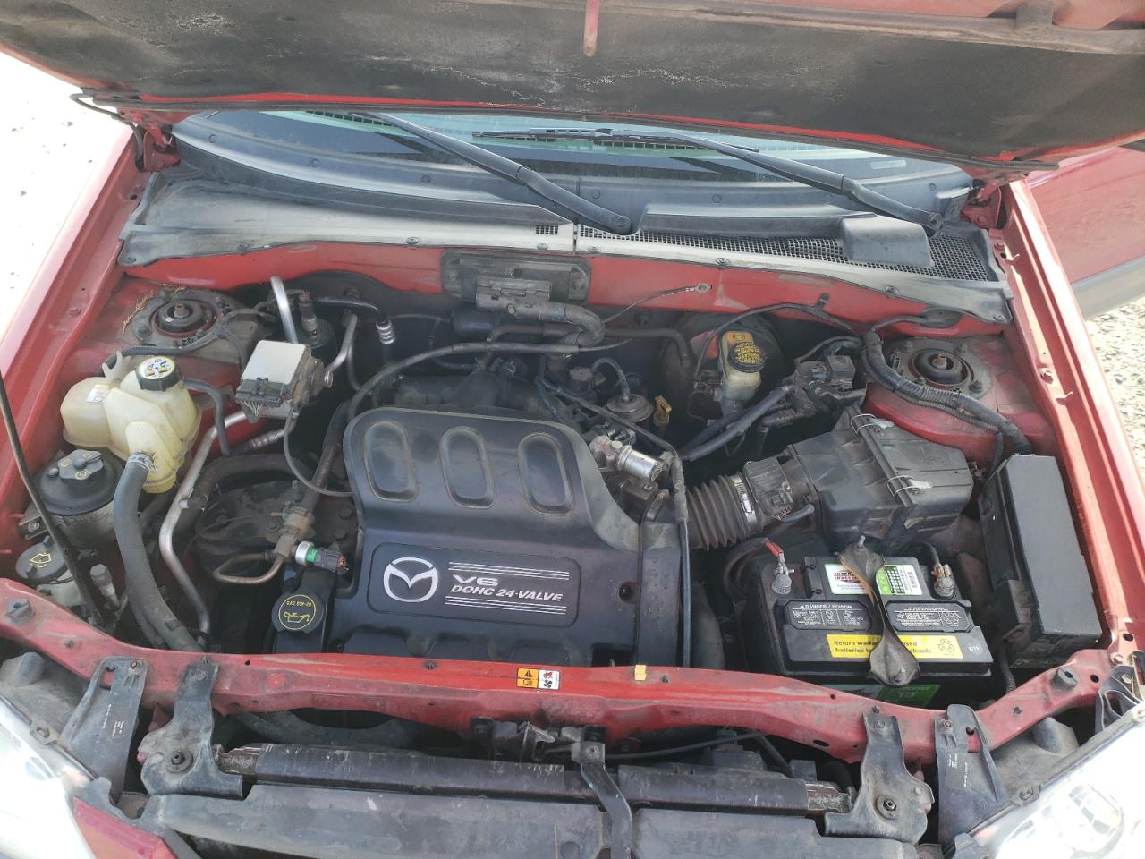 Photo 7 from auction – 2003 MAZDA TRIBUTE ES with VIN 4F2CZ96163KM04811
