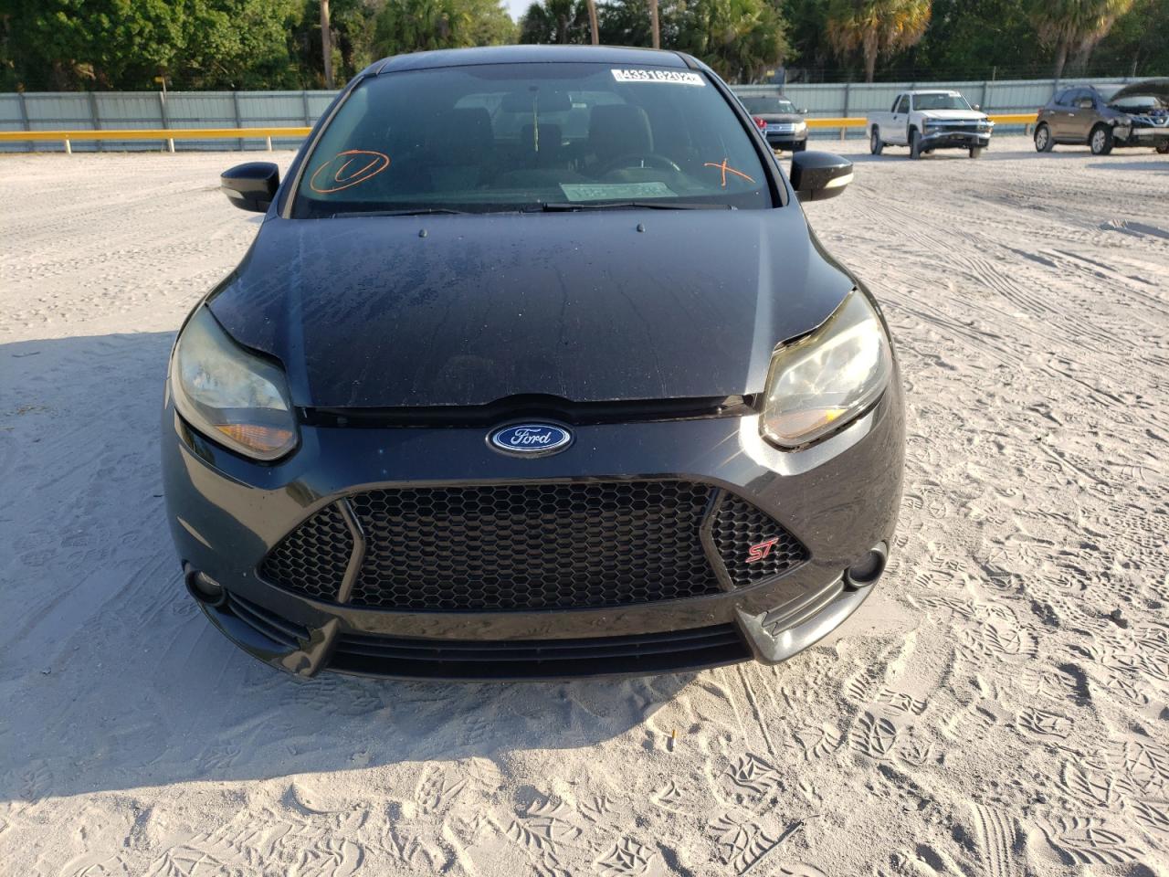 Photo 9 from auction – 2014 FORD FOCUS ST with VIN 1FADP3L96EL215533